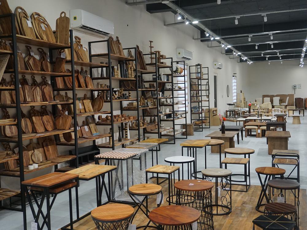 Finished wooden furniture displayed in a showroom